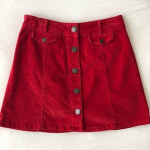 Red corduroy mini skirt with buttons